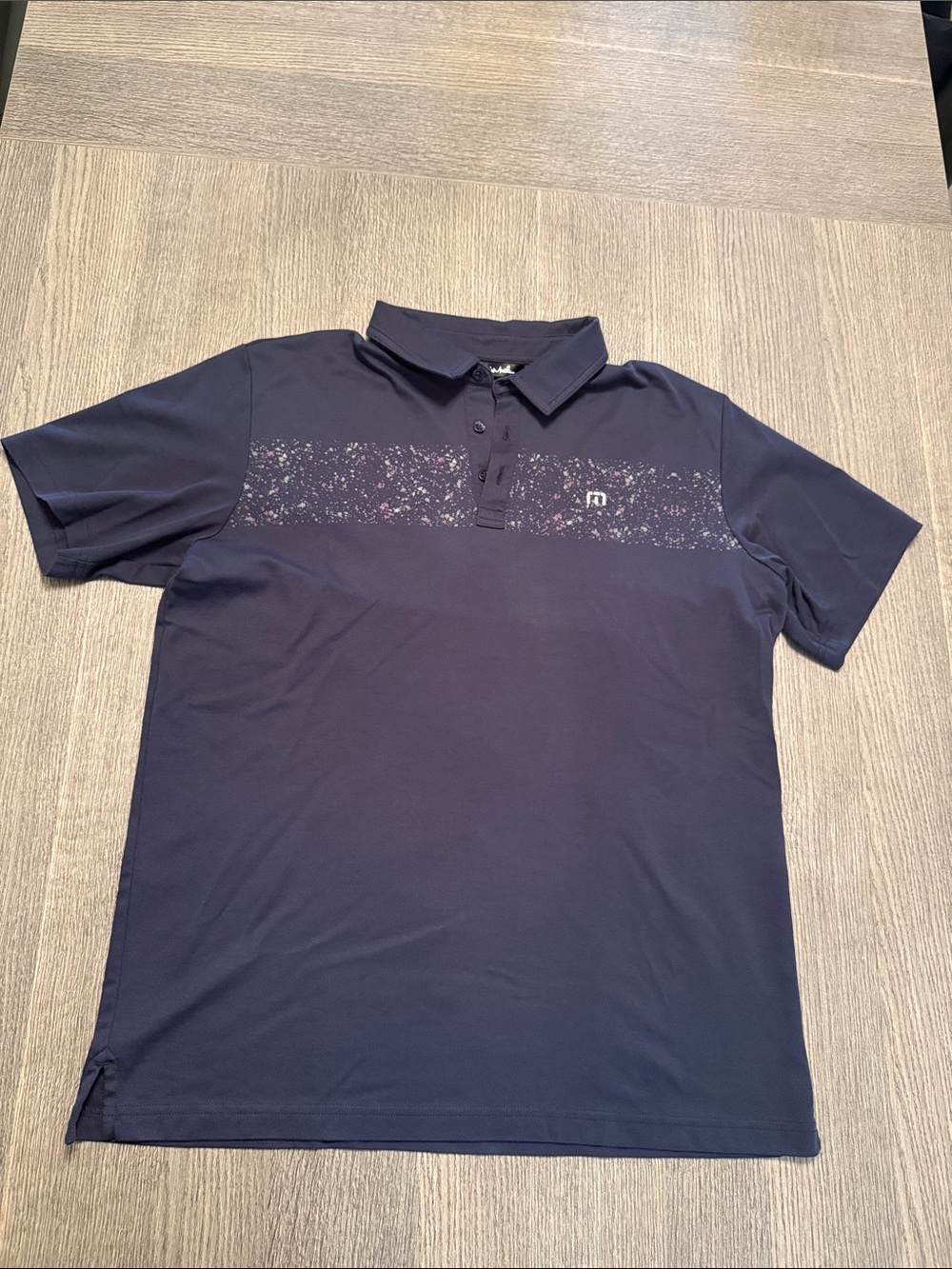 Travis Mathew Navy Polo with Speckled Chest Stripe